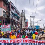 Protests in Nigeria on October 1st against rising cost of living coincide with Independence Day. Citizens urge government action.